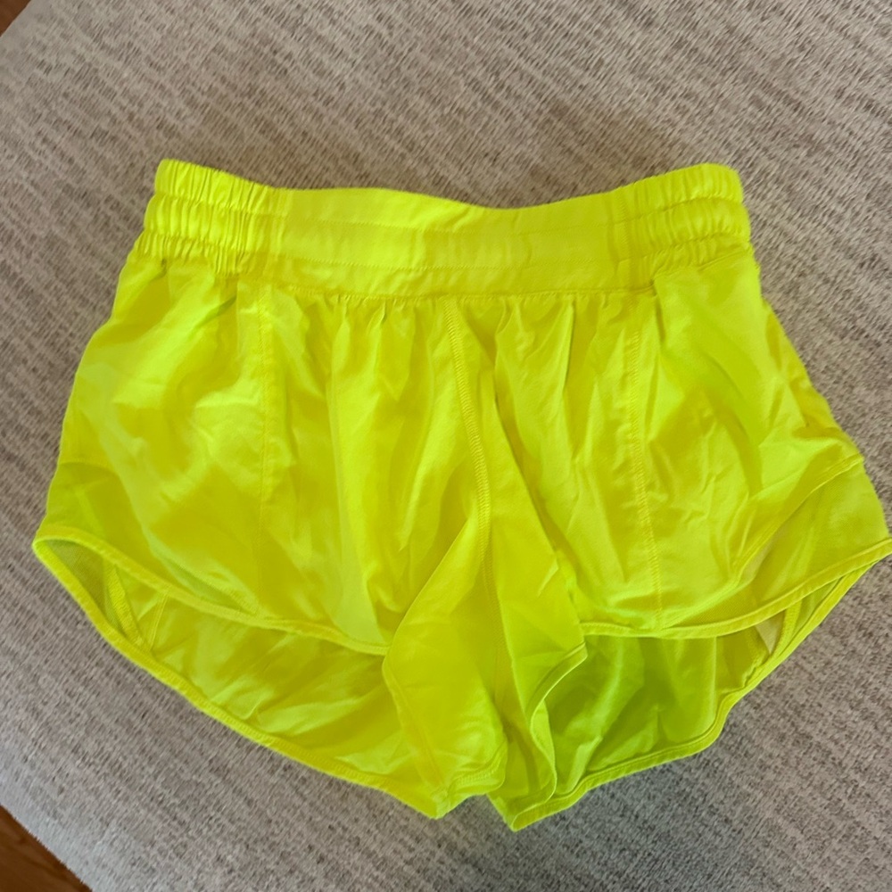 Size 4 Lululemon neon yellow hotty hot 2.5 length shorts